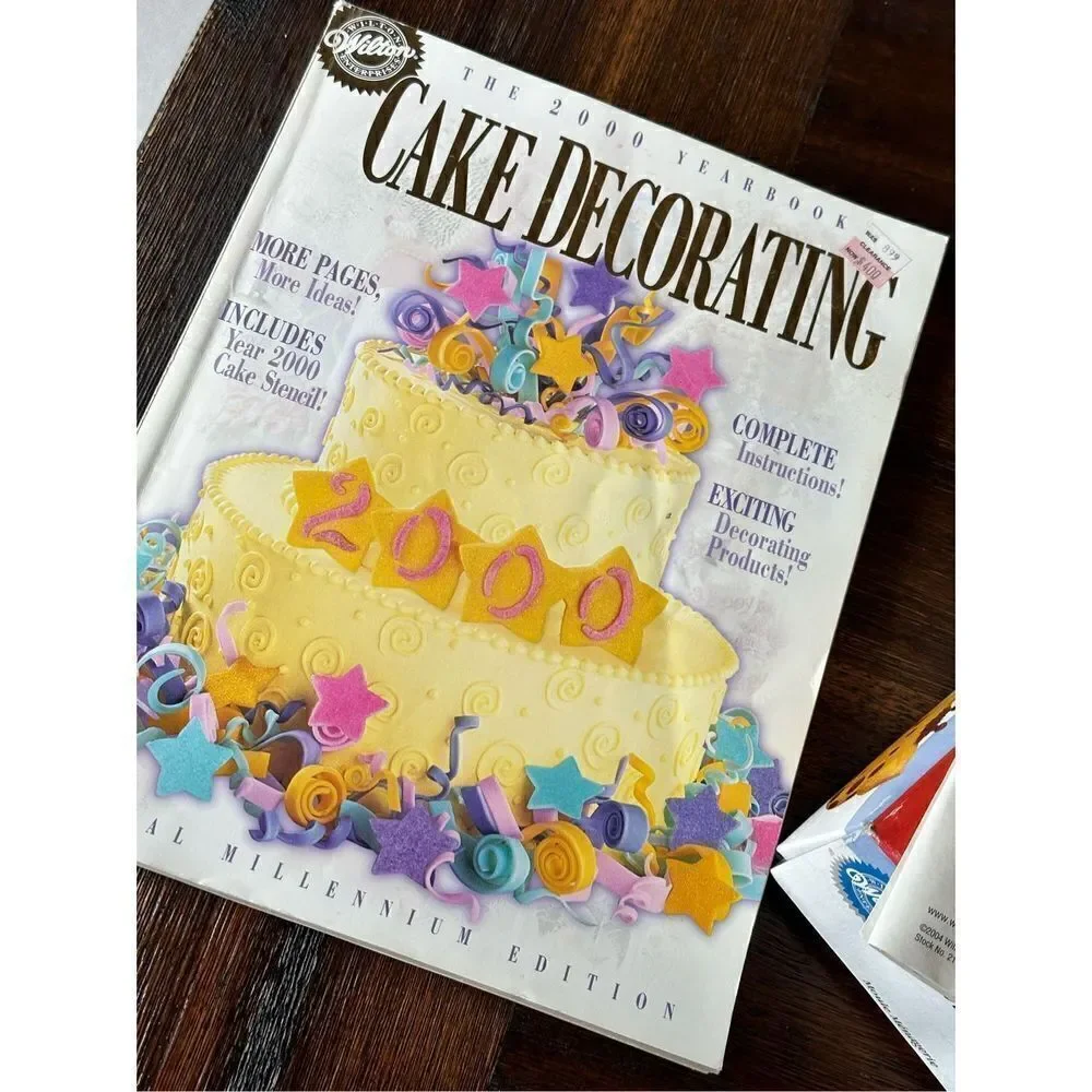 Vintage Wilton cake pan and year 2000 Cake decorating book